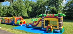 294531468 466306428832923 6966077039477686749 n 1686936750 Jungle Yellow Bounce House With A DRY Slide